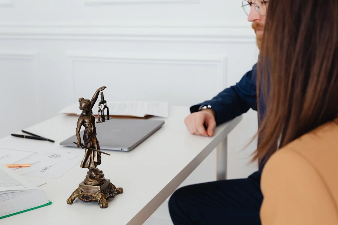 couple sitting in lawyer's office