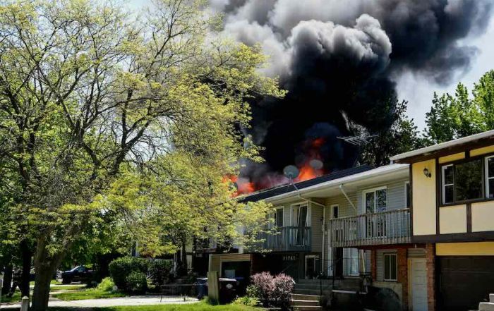 house fire in row of semi-detached housing
