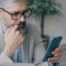 man reading from phone