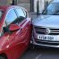 A picture of two cars crashed into each other