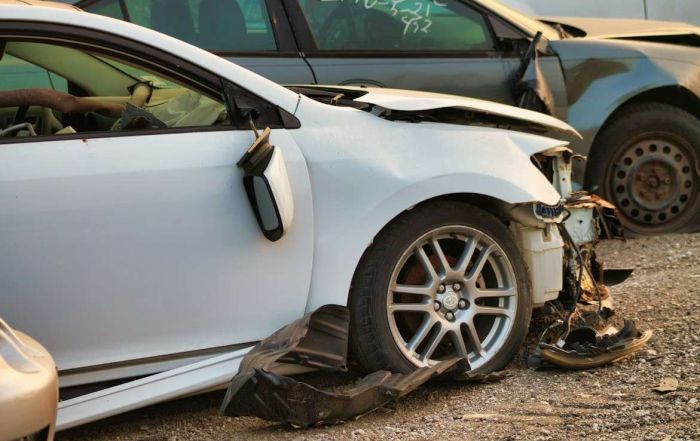 A car with immense damage to its front